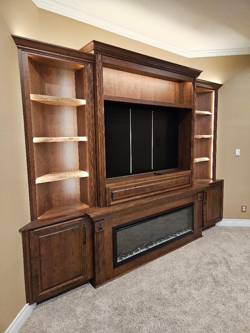 Custom Master Bedroom Media Center With Electric Fireplace in the Houston Area